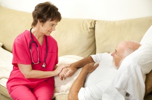 Nurse with patient on couch